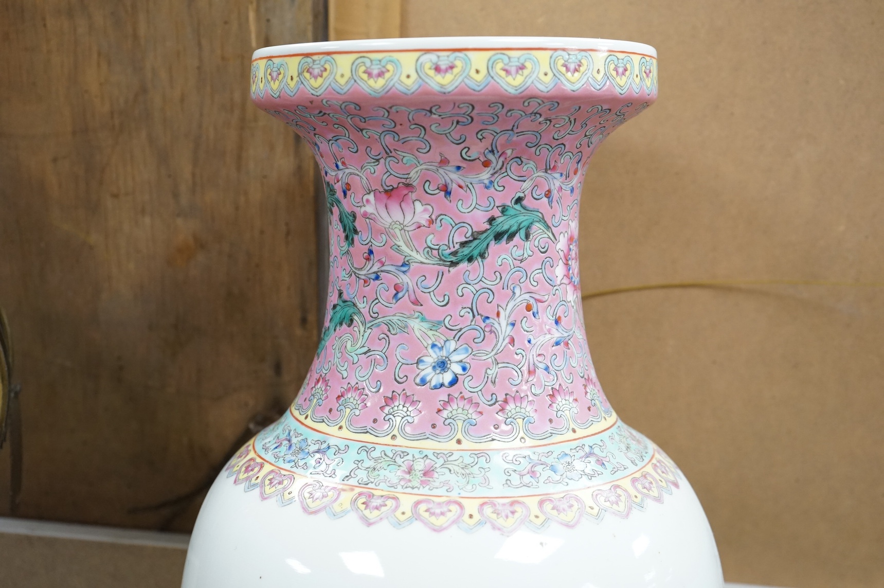 A large Chinese famille rose figurative baluster vase, 63cm high. Condition - fair
